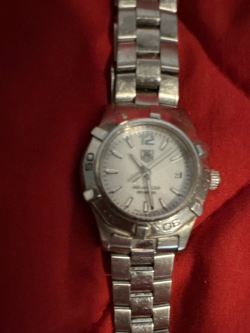 Tag Heuer Silver Watch with White Dial